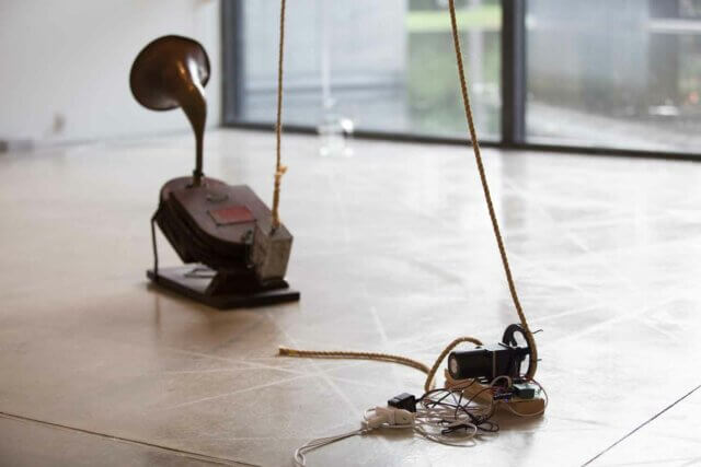 Yuko Mohri, Moré Moré (Leaky): The Falling Water Given #1-3, 2015, Wood, umbrella, hose, PET bottles, rubber glove, bucket, wheel, duster, sponge, pump, acrylic resin, etc. 2725×1758×500mm (×3). Photo: Keizo Kioku. Photo Courtesy: Nissan Art Award